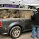 Illustration for article titled Sand Artist Scott Wade Makes Art Out Of Ford Flex